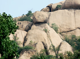 Red Boy Shaped Rock